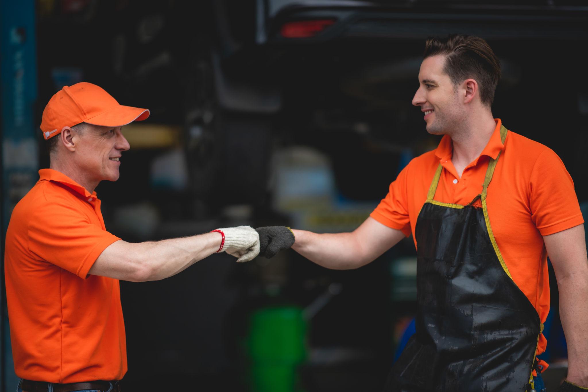 Mechanic servicing a car engine in a professional auto repair garage in Bristol